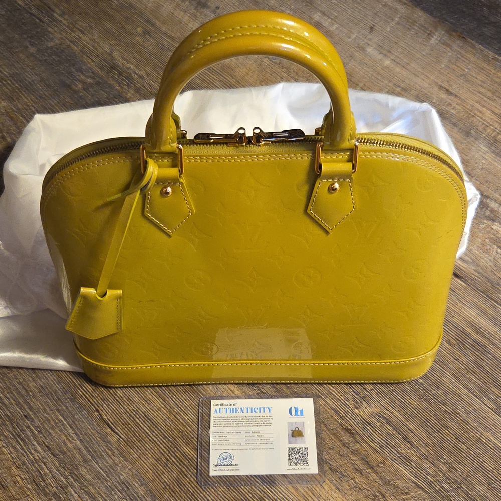 Louis Vuitton Monogram Yellow Vernis Alma Clotche Gold Hardwear Satchel Hand Bag